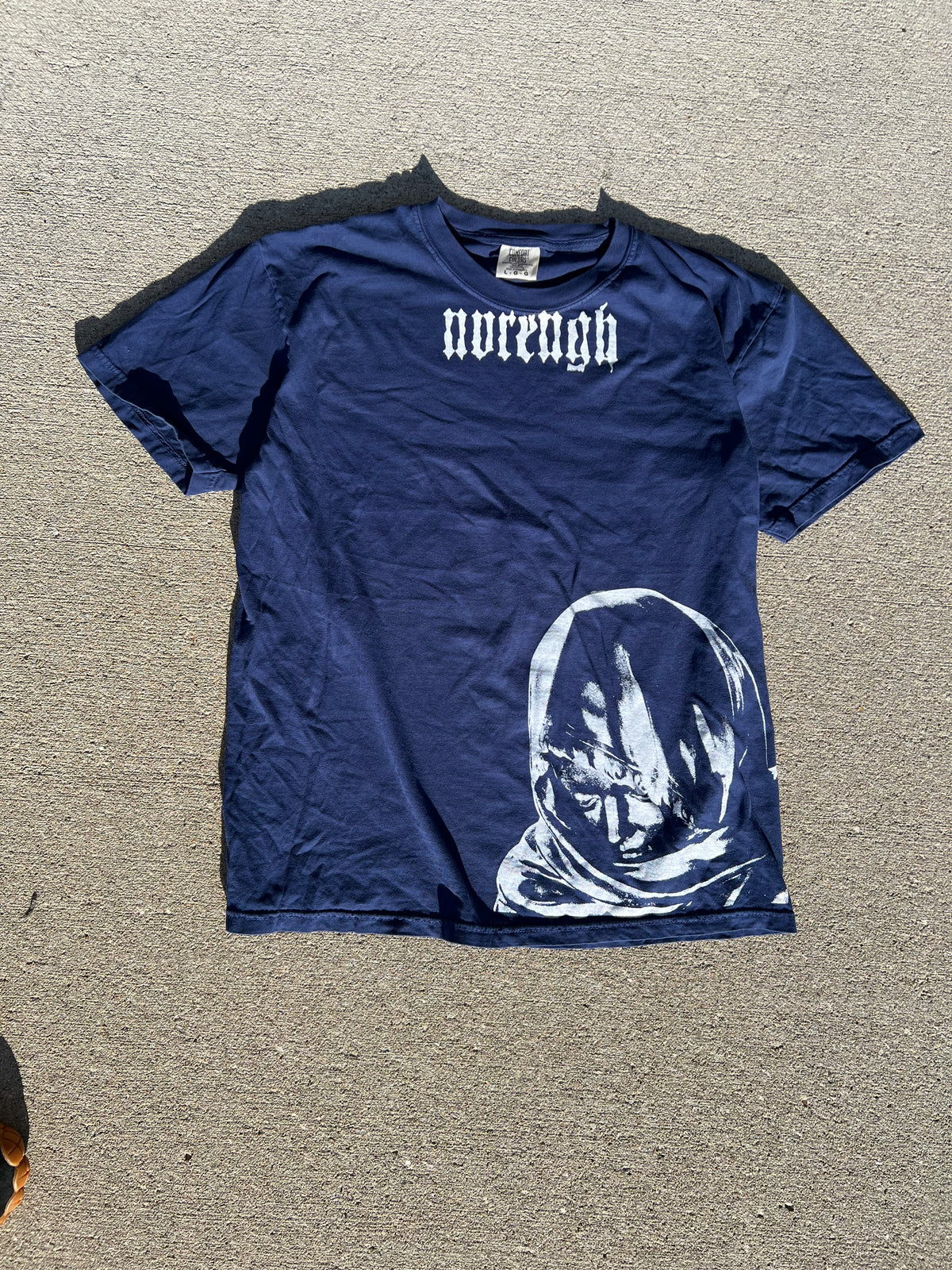 One of on blue tee