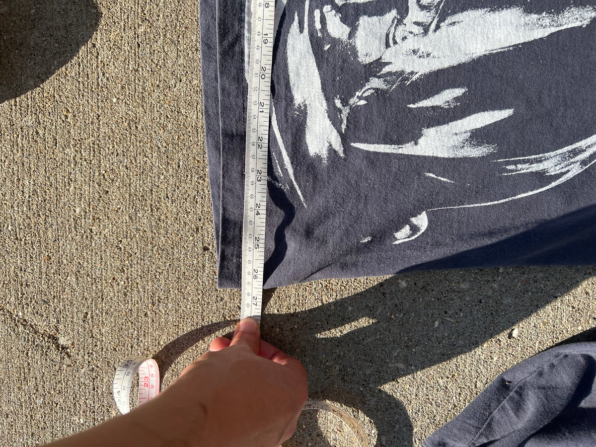One of one long sleeve pocket tee