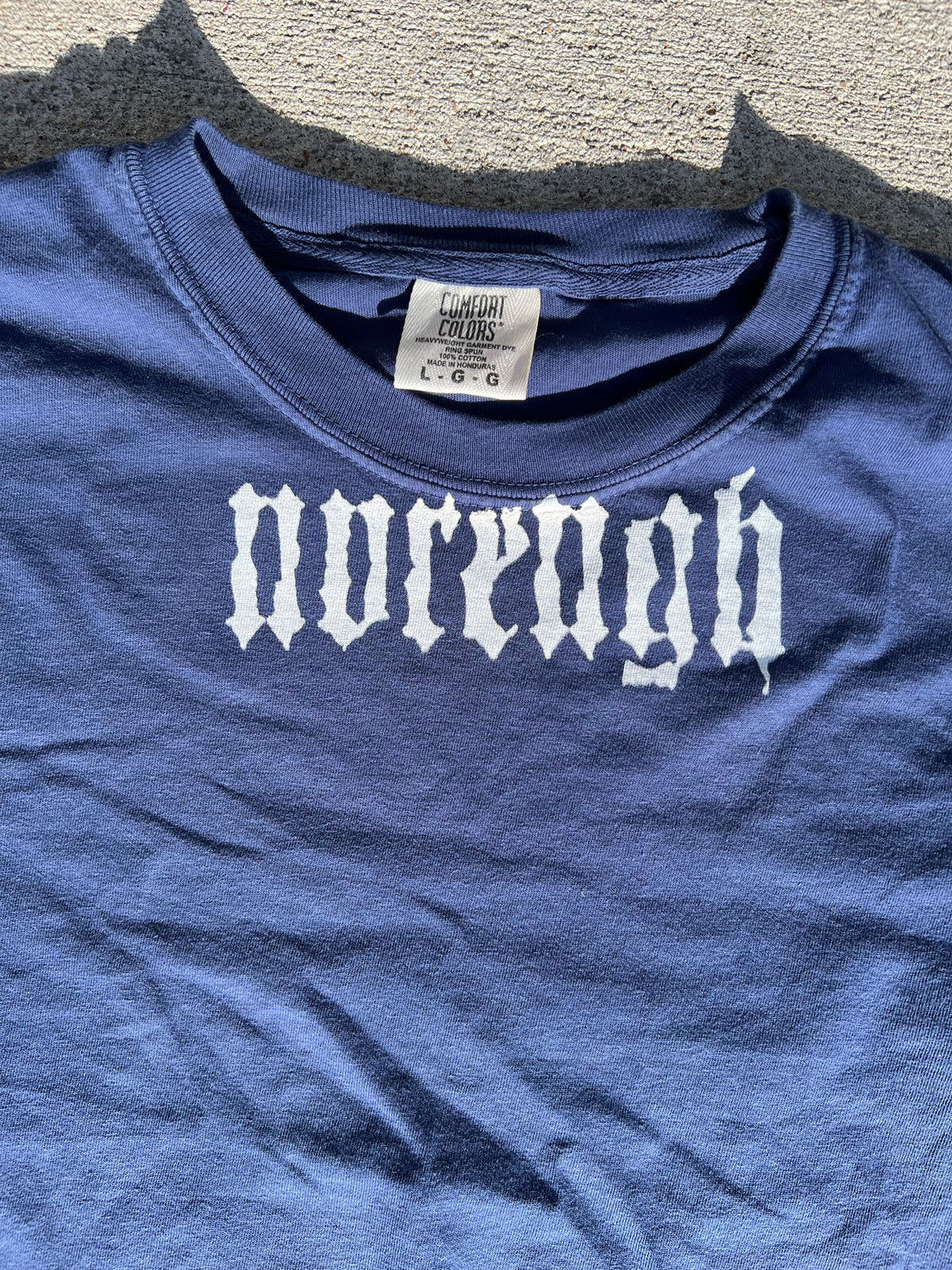 One of on blue tee